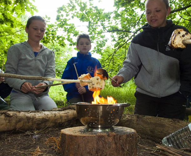 Former Year 6 Pupils enjoying Forest School at Windmill Hill